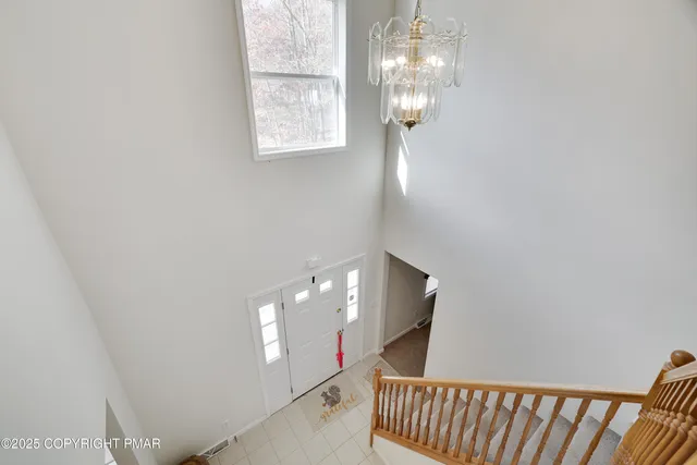 a view of a hallway with windows