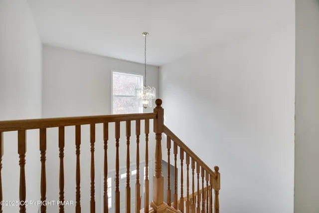 a view of hallway with staircase