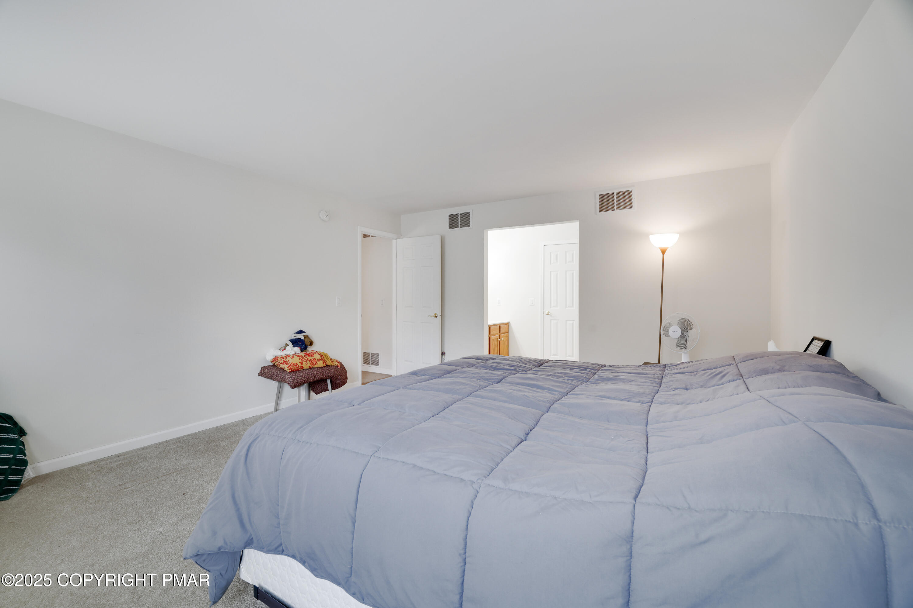 138 Jennifer Lane Effort, PA 18330 - Photo 26 of 41 a bed room with a bed and a closet