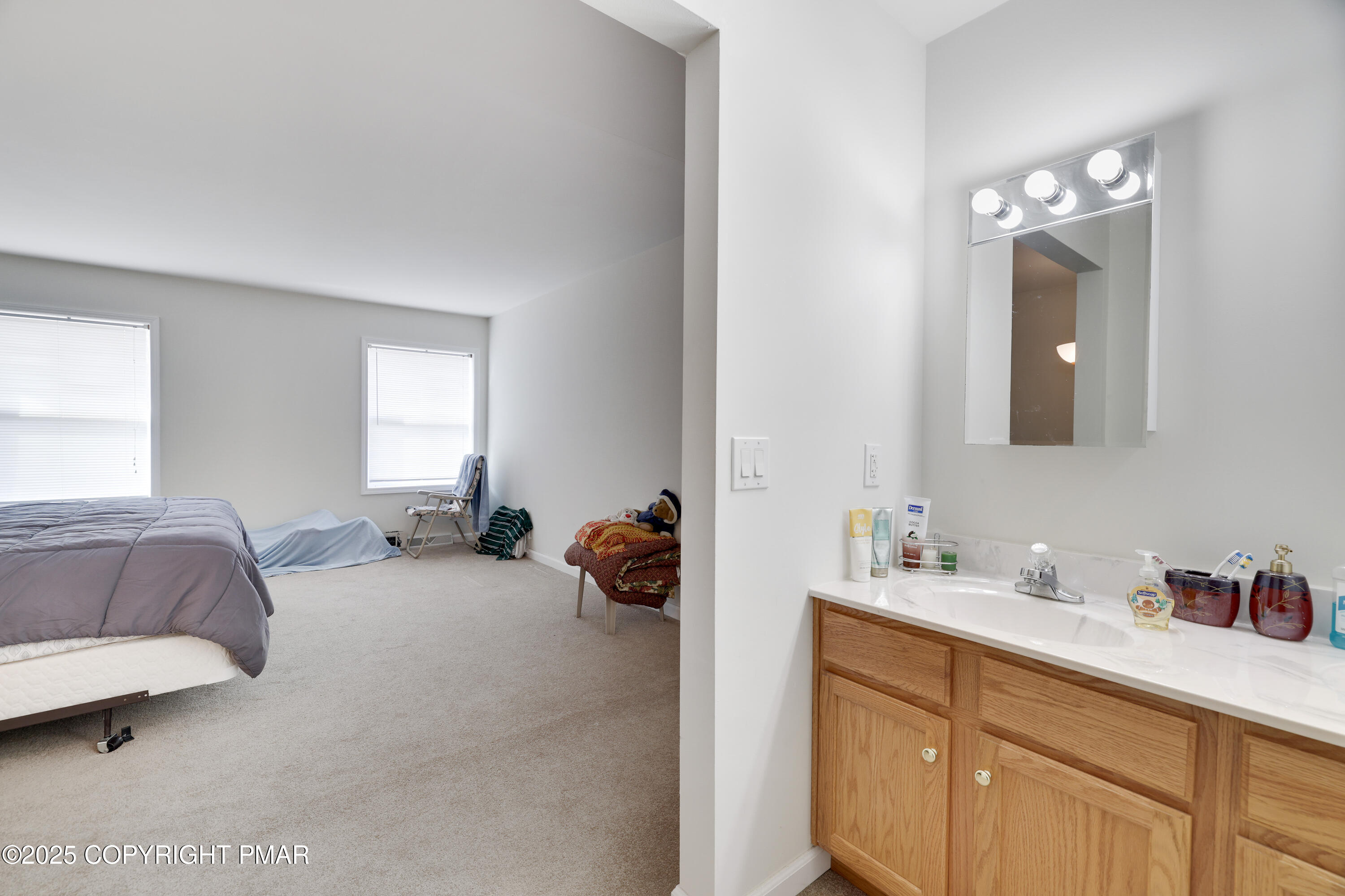 138 Jennifer Lane Effort, PA 18330 - Photo 29 of 41 a en suite bathroom with a double vanity sink and a mirror