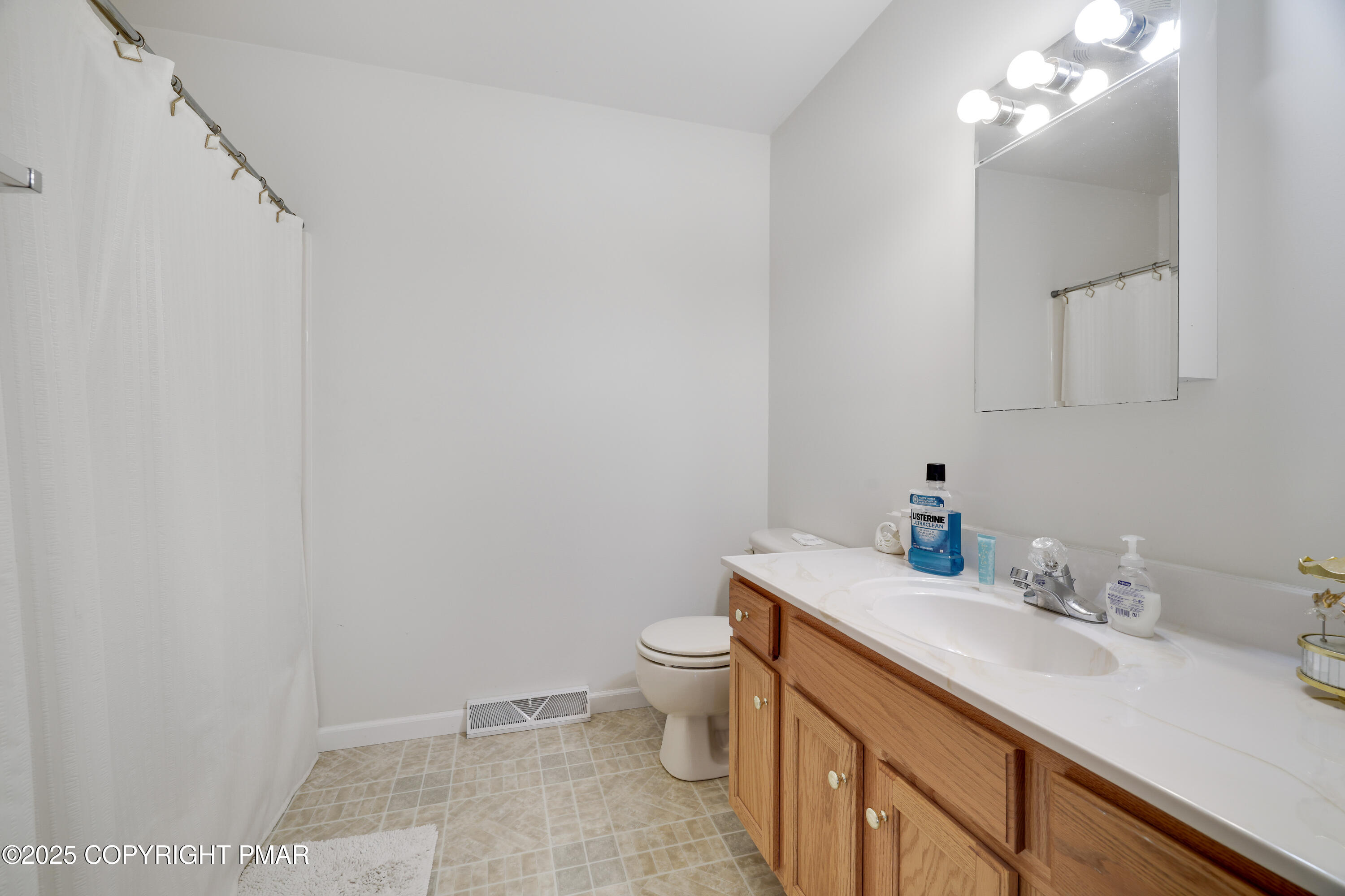 138 Jennifer Lane Effort, PA 18330 - Photo 34 of 41 a bathroom with a sink vanity and a toilet