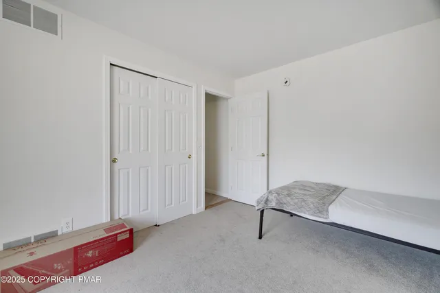 a livingroom with a rug