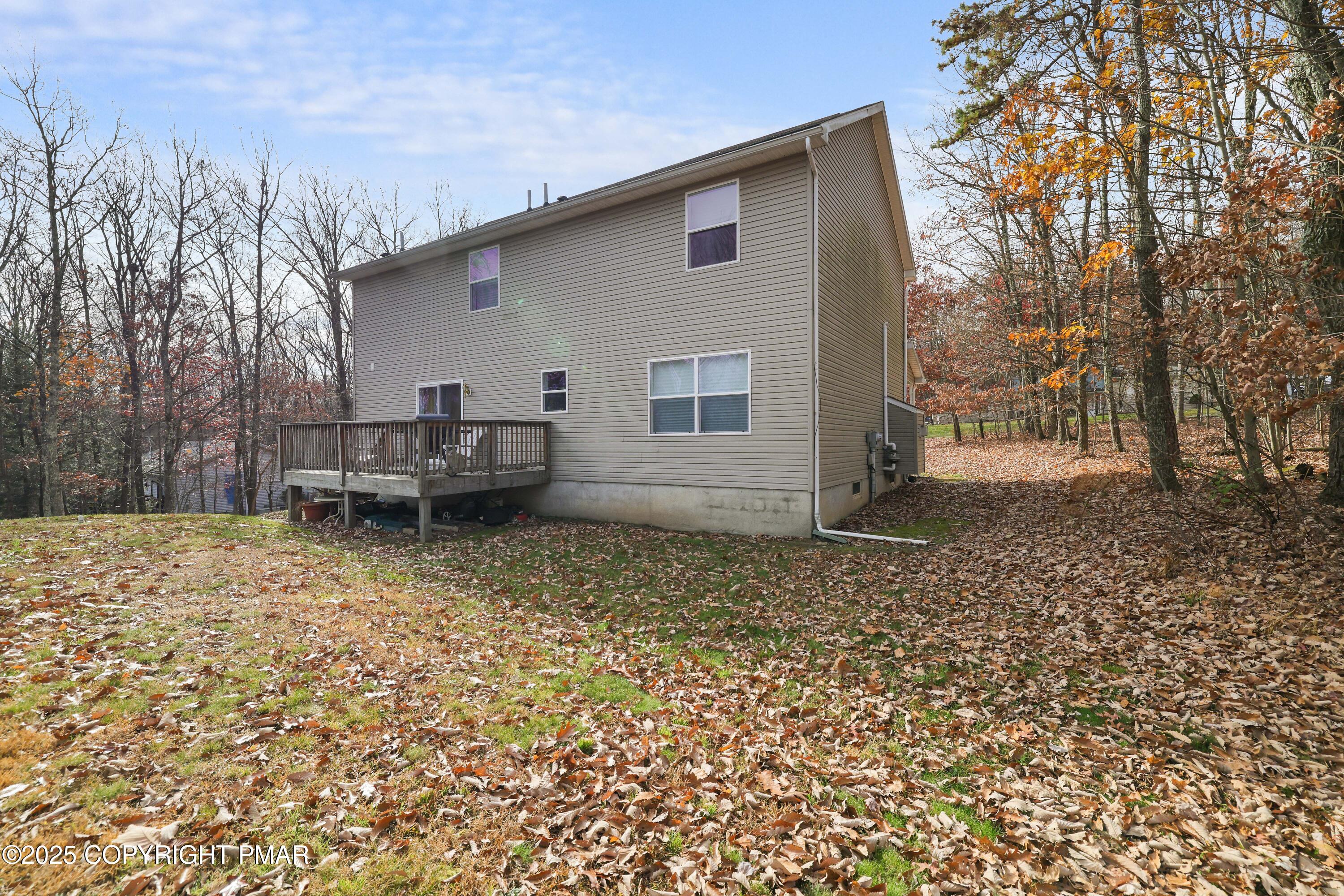 138 Jennifer Lane Effort, PA 18330 - Photo 5 of 41 a backyard of a house with yard and outdoor seating