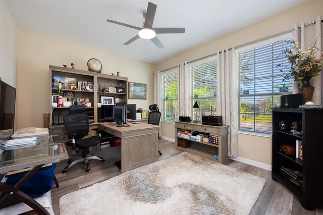 a bedroom with a bed and a table