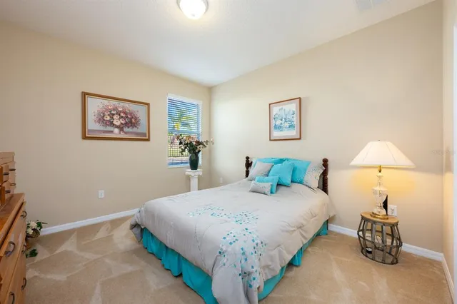 a bathroom with a double vanity sink mirror and toilet