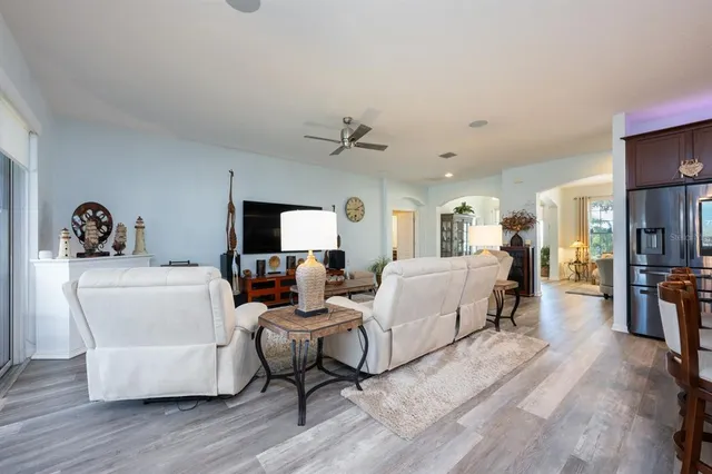 a living room with furniture and a table