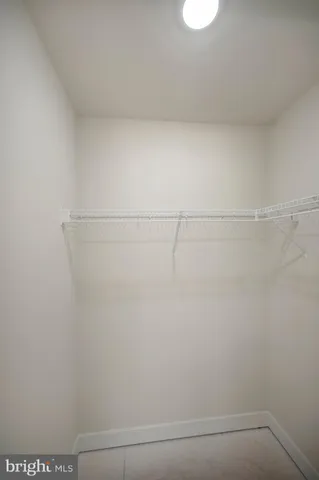 a bath room with a toilet and a bath tub