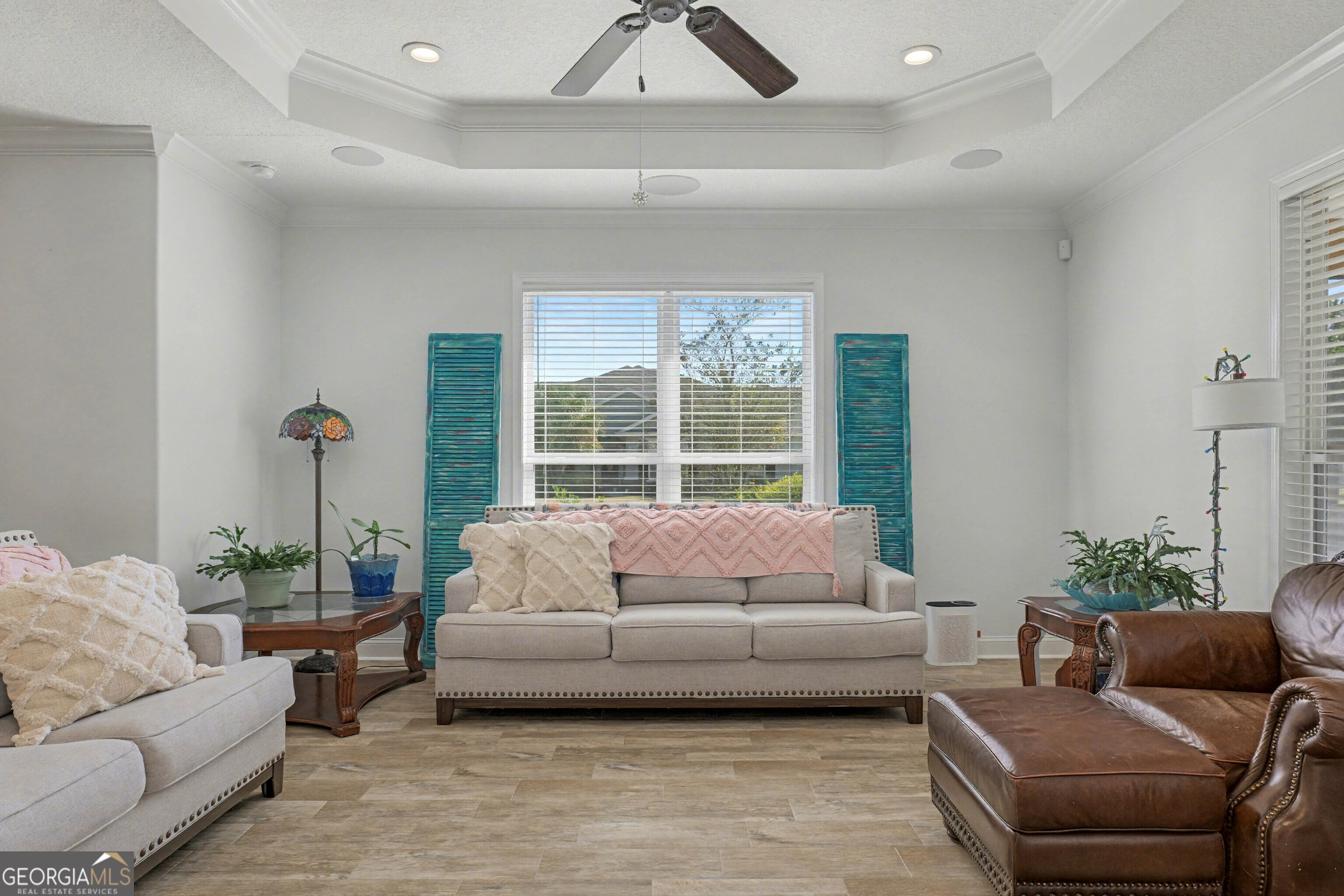 102 Thomas Court Kingsland, GA 31548 - Photo 16 of 59 a living room with furniture and a large window