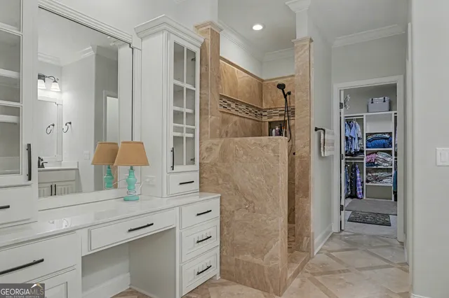 a bathroom with a double vanity sink a mirror and a shower