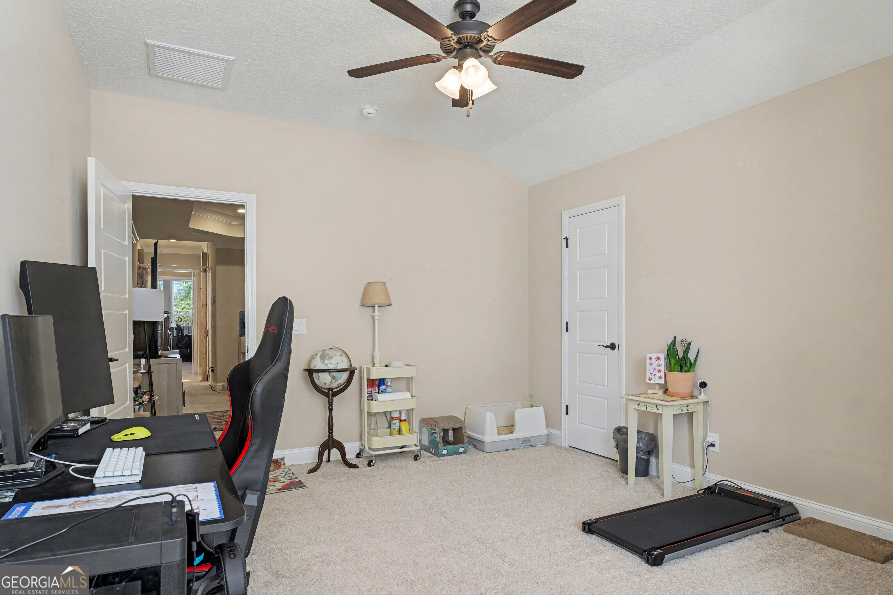 102 Thomas Court Kingsland, GA 31548 - Photo 44 of 59 a room with gym equipment and a flat screen tv