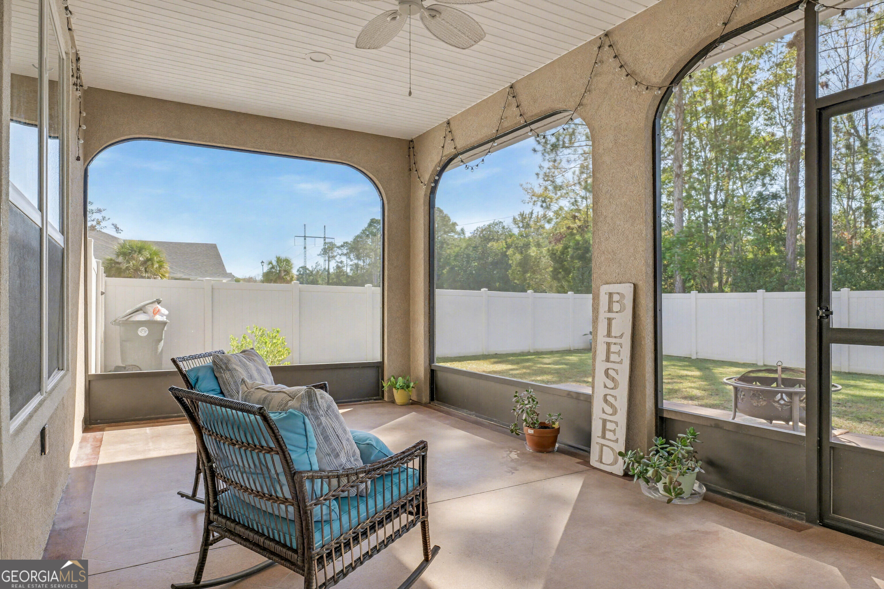 102 Thomas Court Kingsland, GA 31548 - Photo 46 of 59 a view of a porch with furniture and a yard