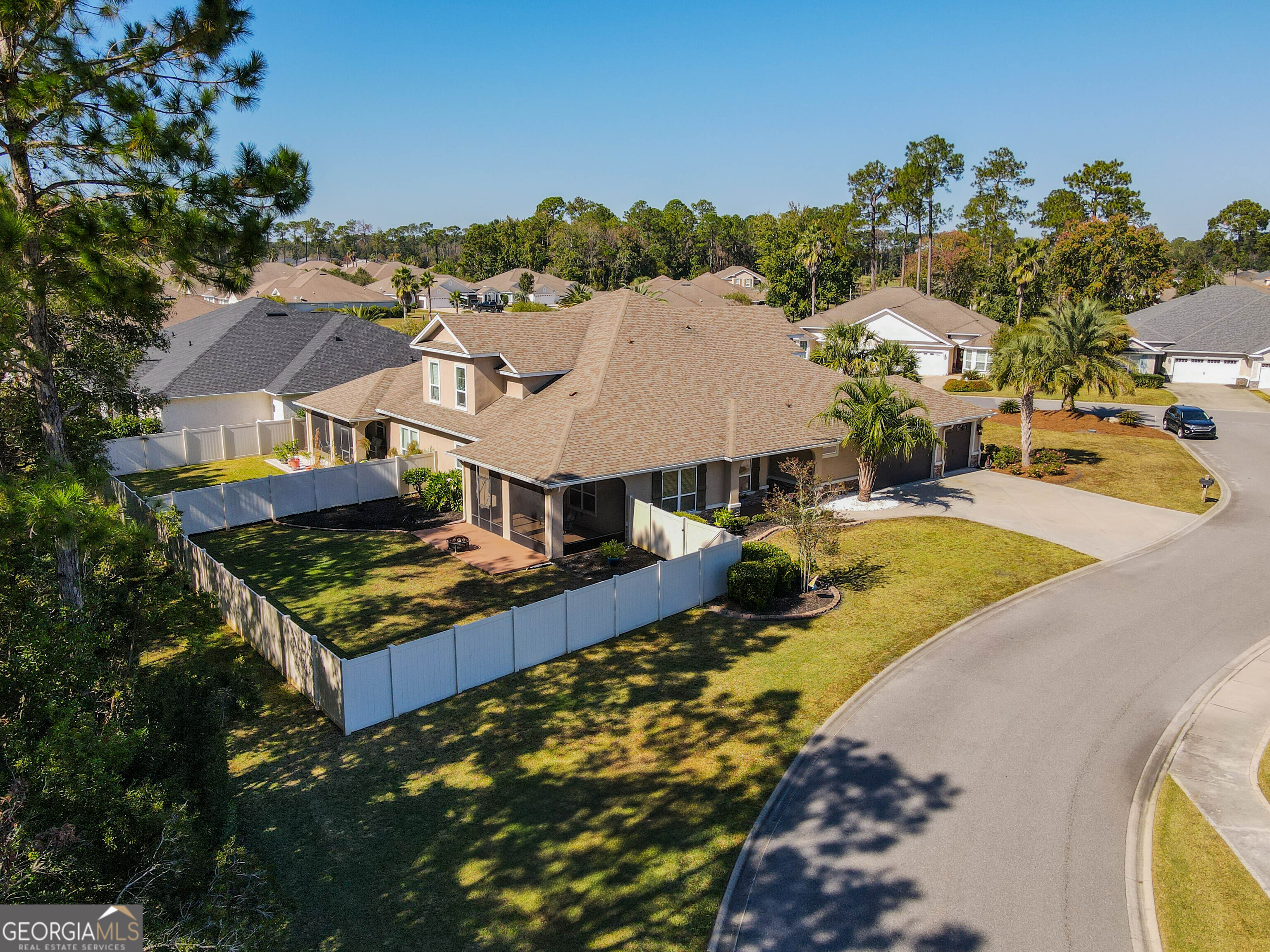102 Thomas Court Kingsland, GA 31548 - Photo 51 of 59 a view of a house with swimming pool and sitting area