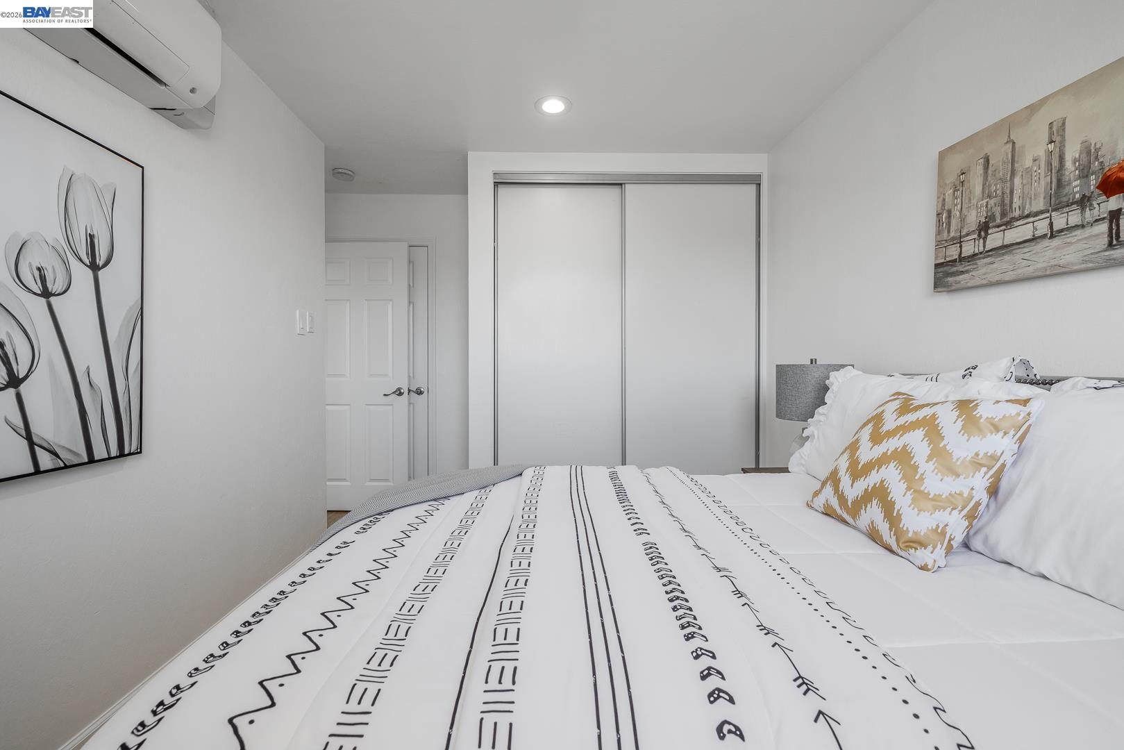 4032 Doane Street Fremont, CA 94538 - Photo 18 of 39 a bedroom with a bed and painting on the wall