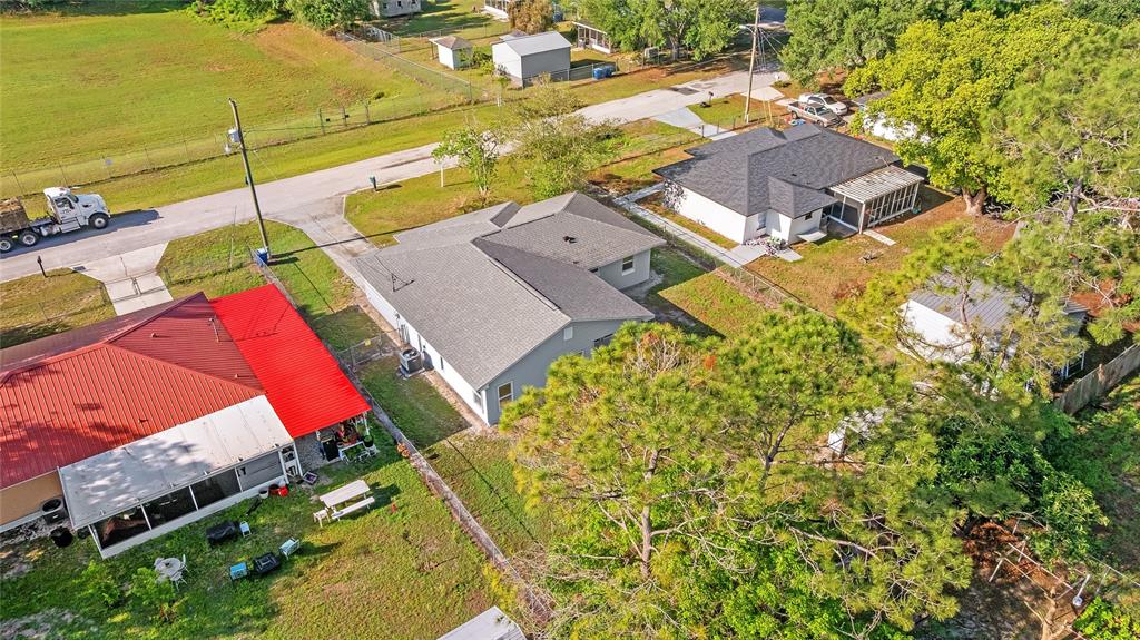 426 Bascom Court Polk City, FL 33868 - Photo 31 of 33 an aerial view of residential houses with outdoor space