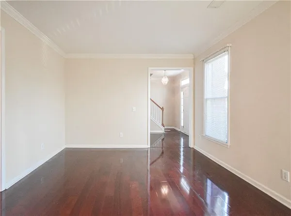 a bathroom with a sink vanity and a toilet