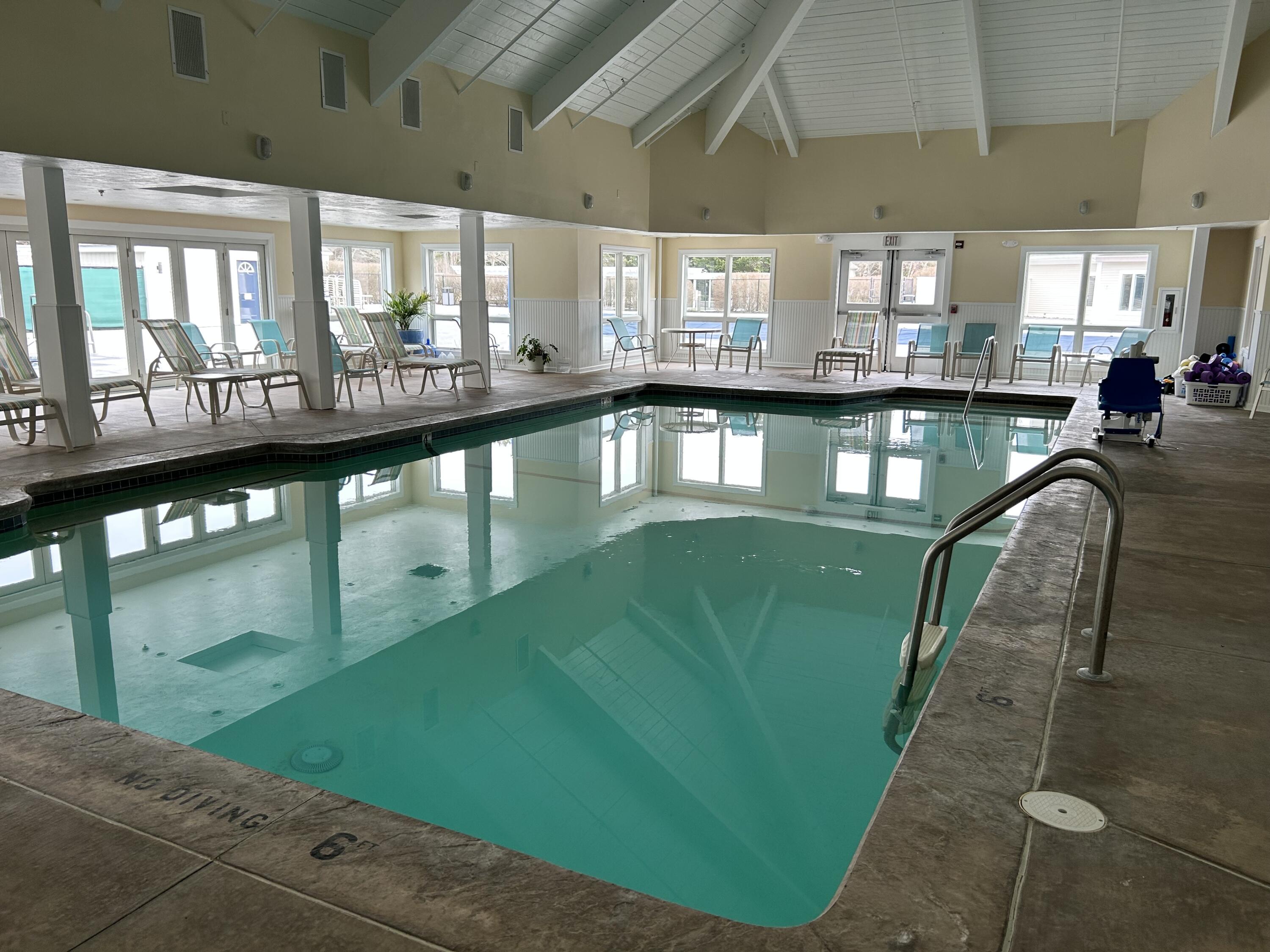 28 Windward Street, Unit 28 Mashpee, MA 02649 - Photo 23 of 37 a view of a swimming pool