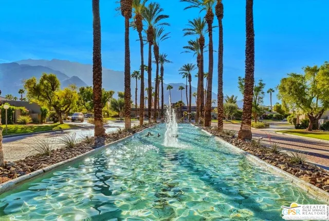 a view of outdoor space and swimming pool