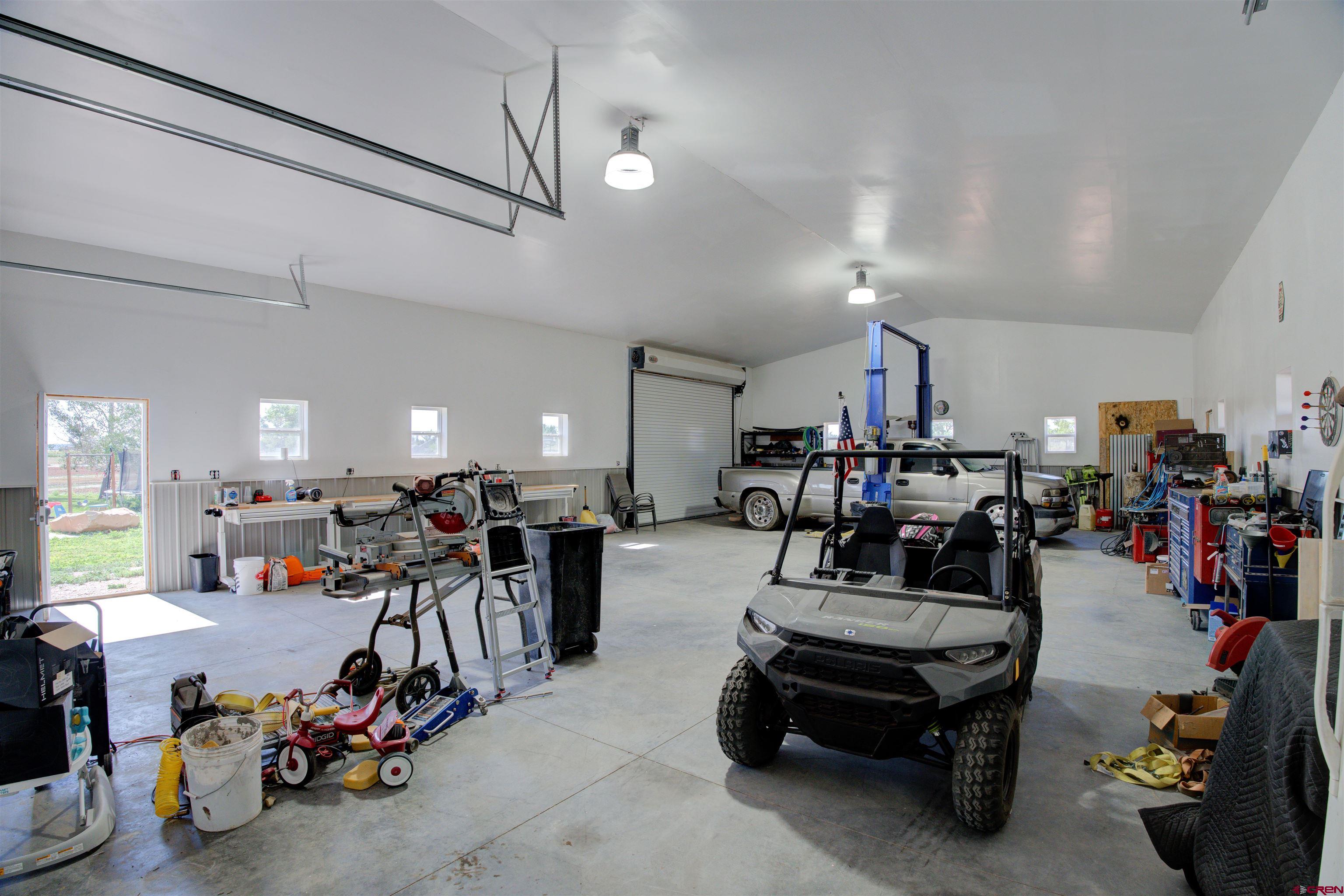 12868 Road 24.4 Loop Cortez, CO 81321 - Photo 22 of 28 a view of a room with gym equipment