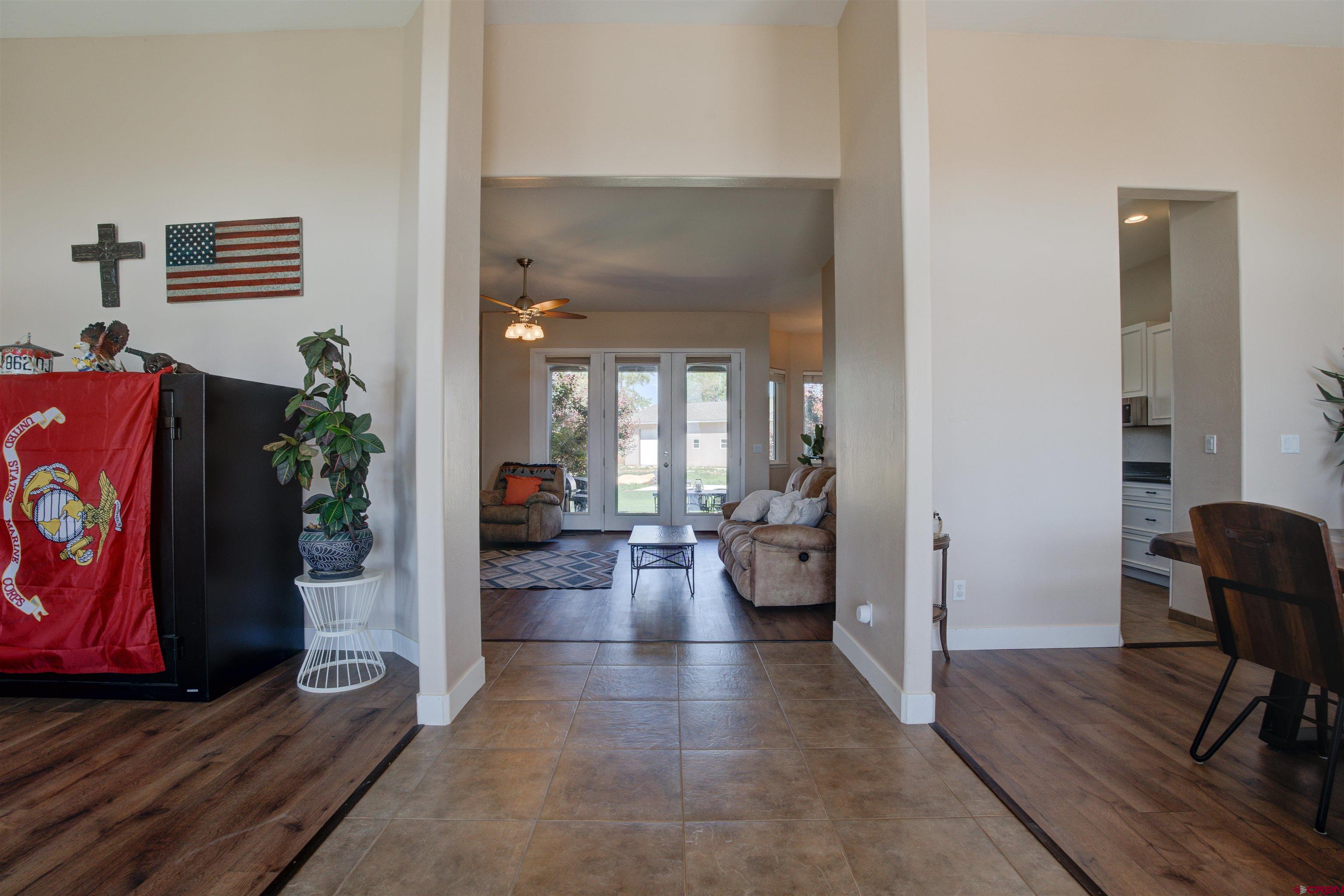 12868 Road 24.4 Loop Cortez, CO 81321 - Photo 4 of 28 a living room with furniture and wooden floor