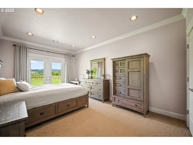 a bed room with a bed and a television