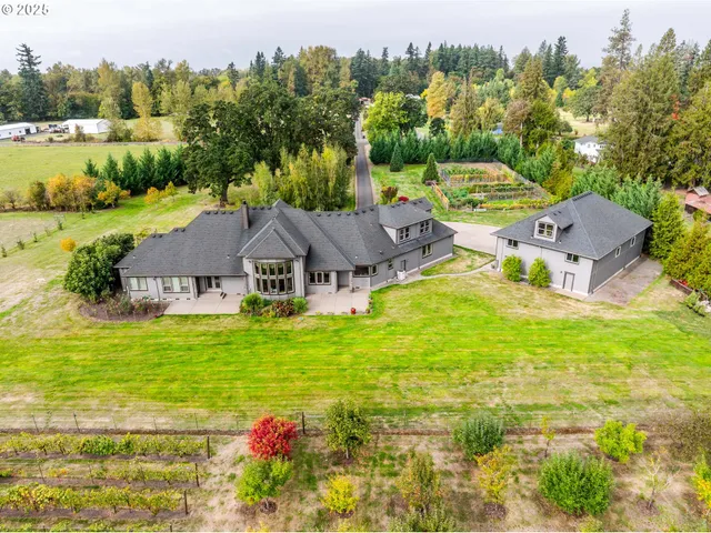 a view of a house with a big yard