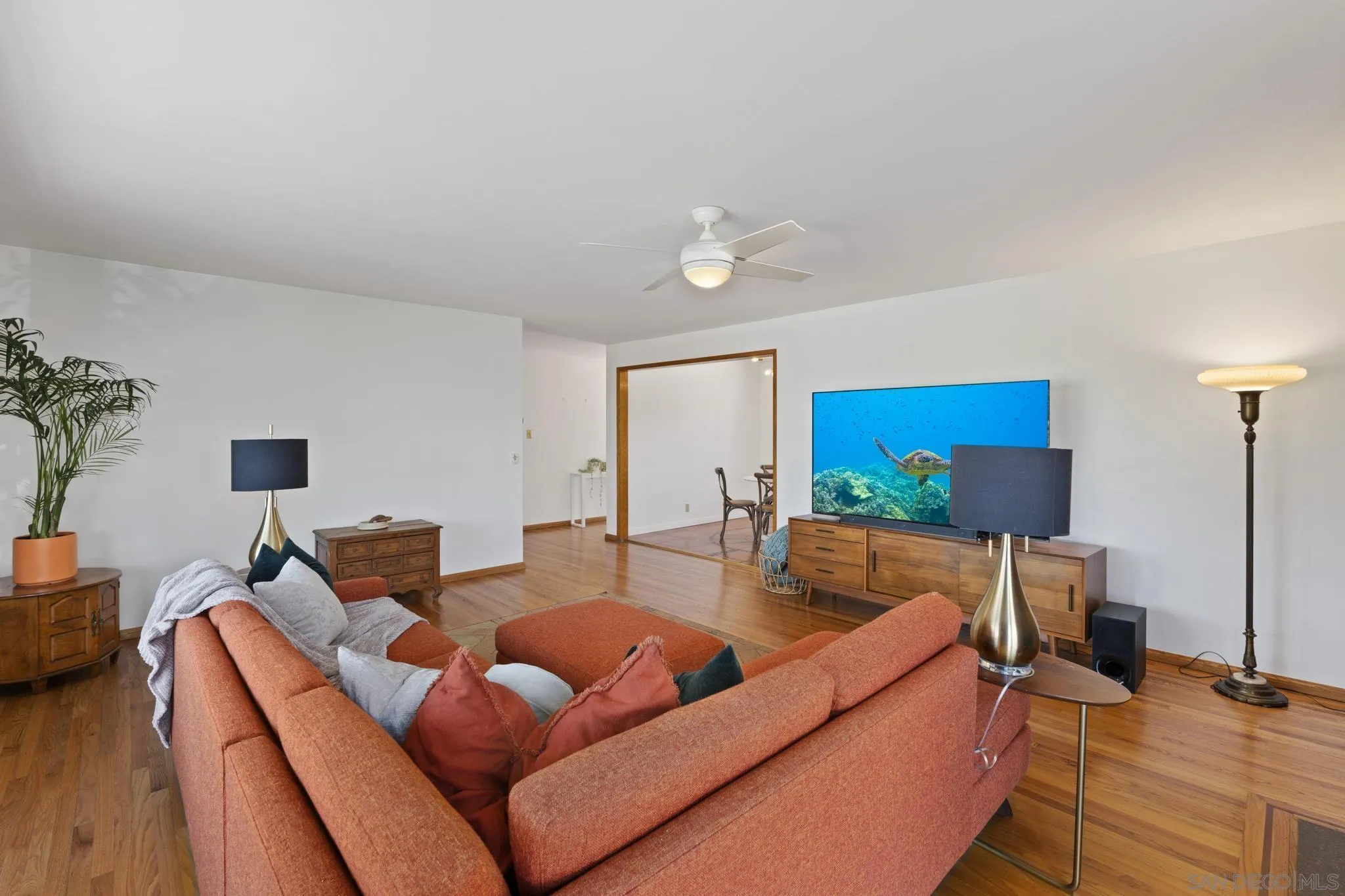 923 Sunset Drive Vista, CA 92081 - Photo 11 of 74 a living room with furniture and a flat screen tv