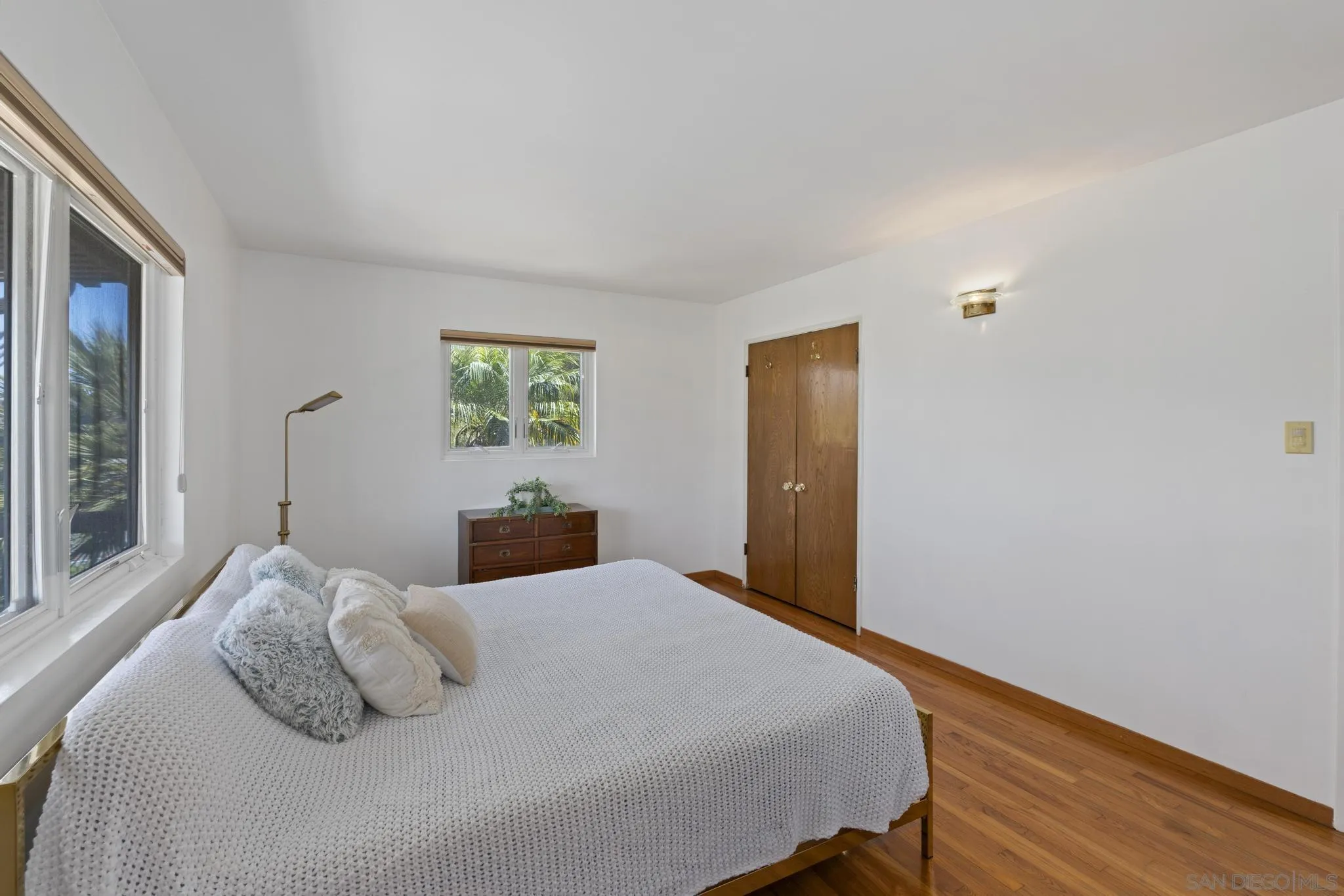 923 Sunset Drive Vista, CA 92081 - Photo 16 of 74 a bedroom with a bed and window