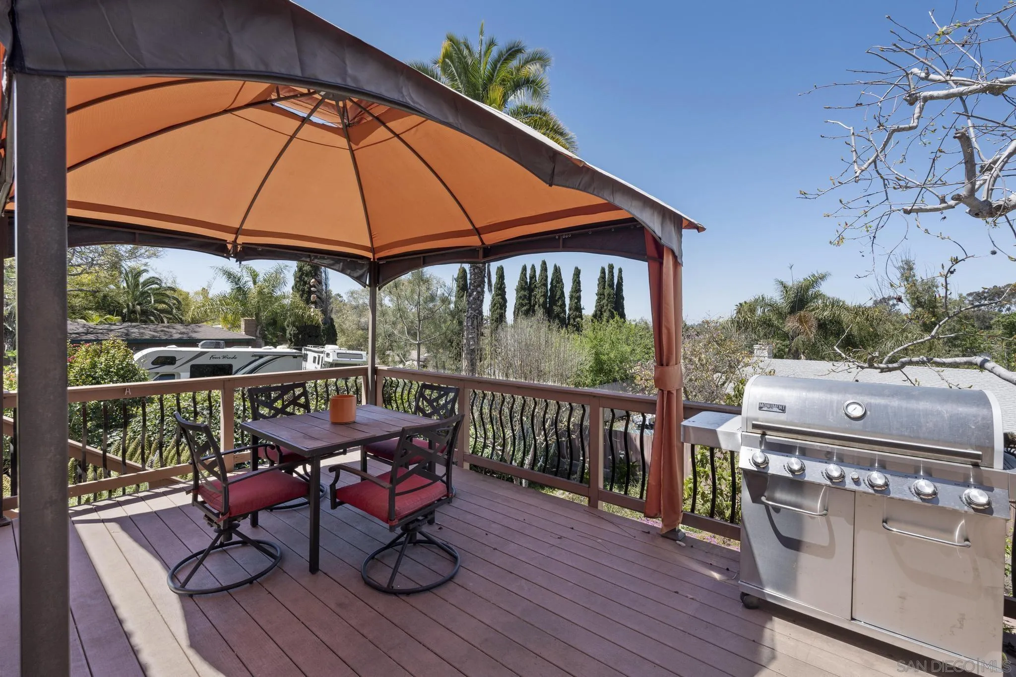 923 Sunset Drive Vista, CA 92081 - Photo 38 of 74 a view of balcony with wooden floor and outdoor seating
