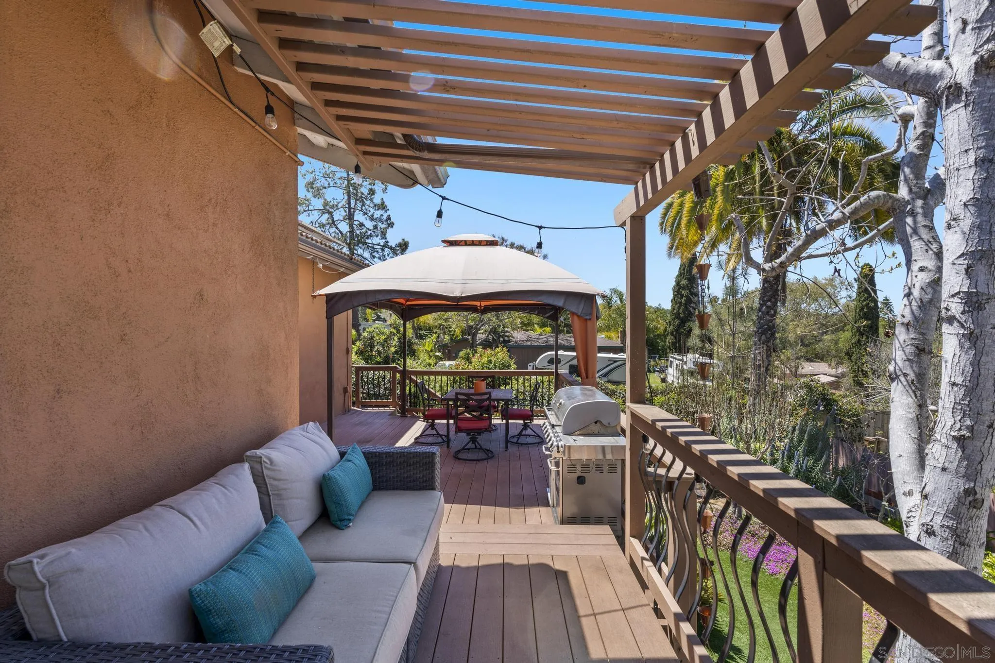 923 Sunset Drive Vista, CA 92081 - Photo 40 of 74 a balcony with furniture and a potted plant
