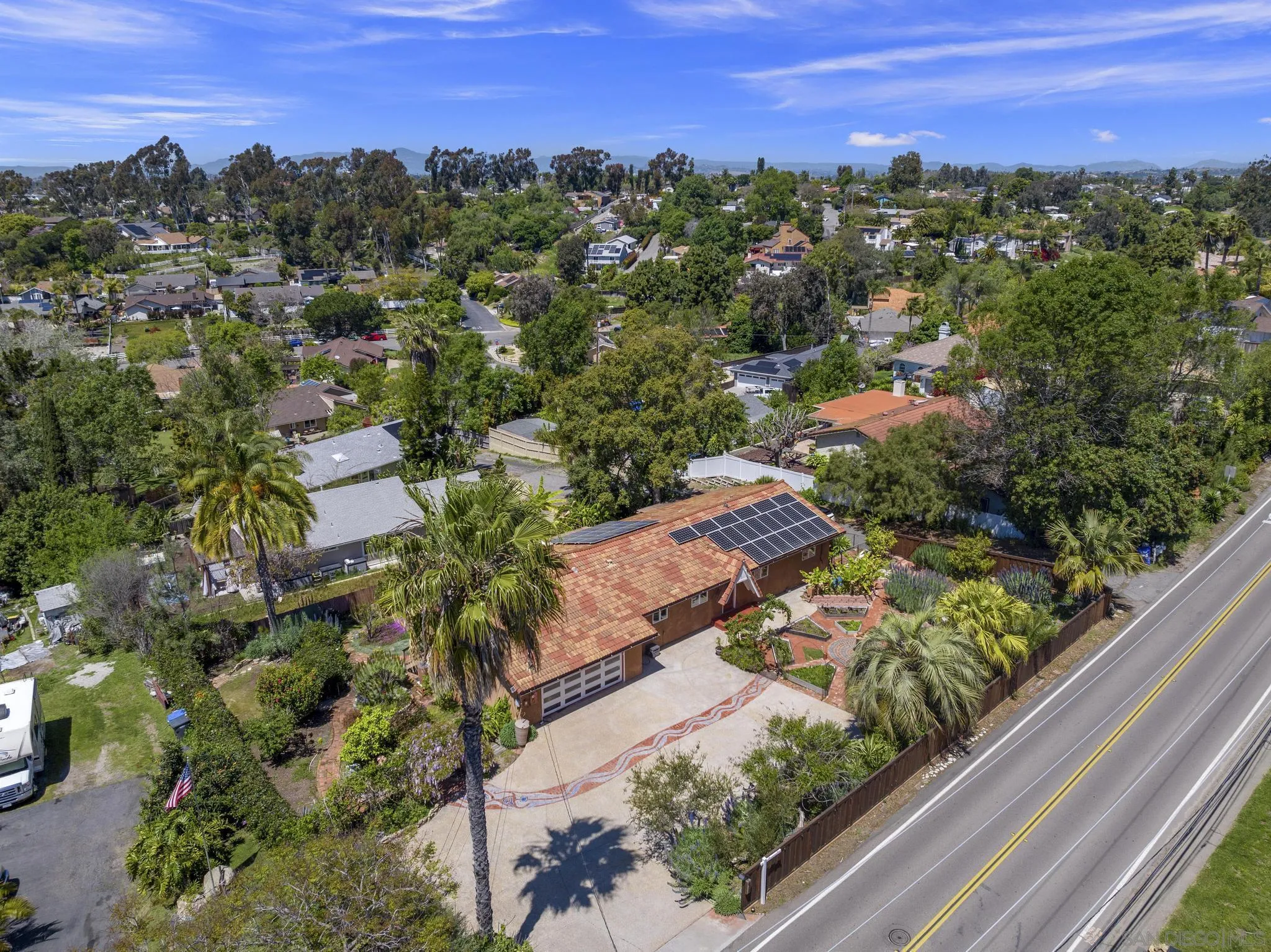 923 Sunset Drive Vista, CA 92081 - Photo 62 of 74 an aerial view of residential houses with outdoor space and street view