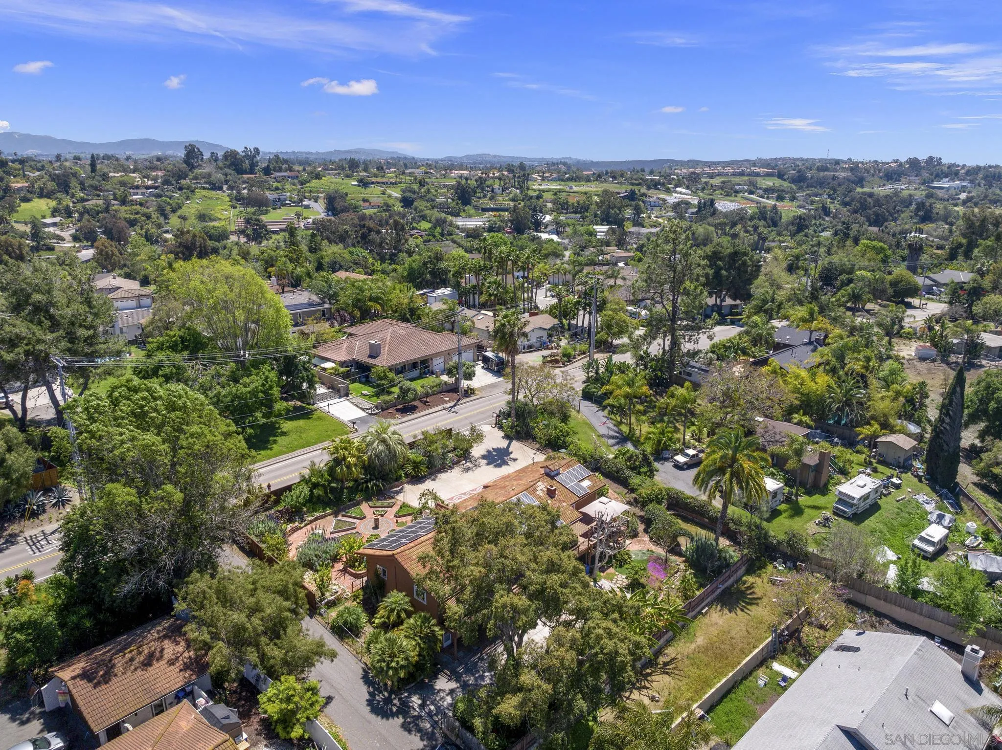 923 Sunset Drive Vista, CA 92081 - Photo 68 of 74 an aerial view of a city with lots of residential buildings