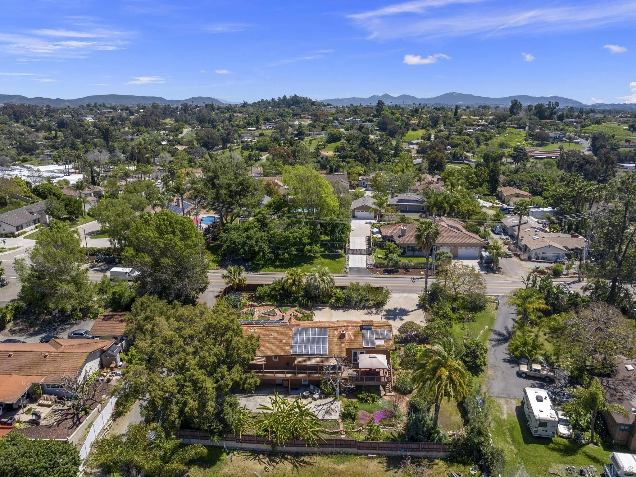 923 Sunset Drive Vista, CA 92081 - Photo 69 of 74 an aerial view of residential houses with outdoor space and street view
