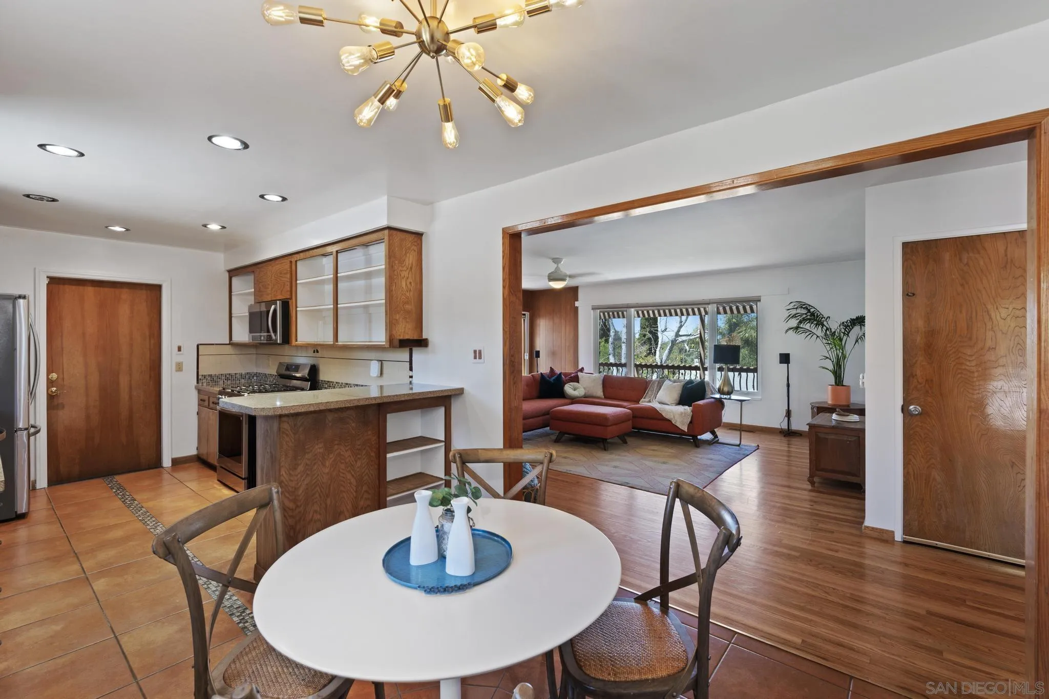 923 Sunset Drive Vista, CA 92081 - Photo 7 of 74 a open dining room with stainless steel appliances furniture a window and kitchen view