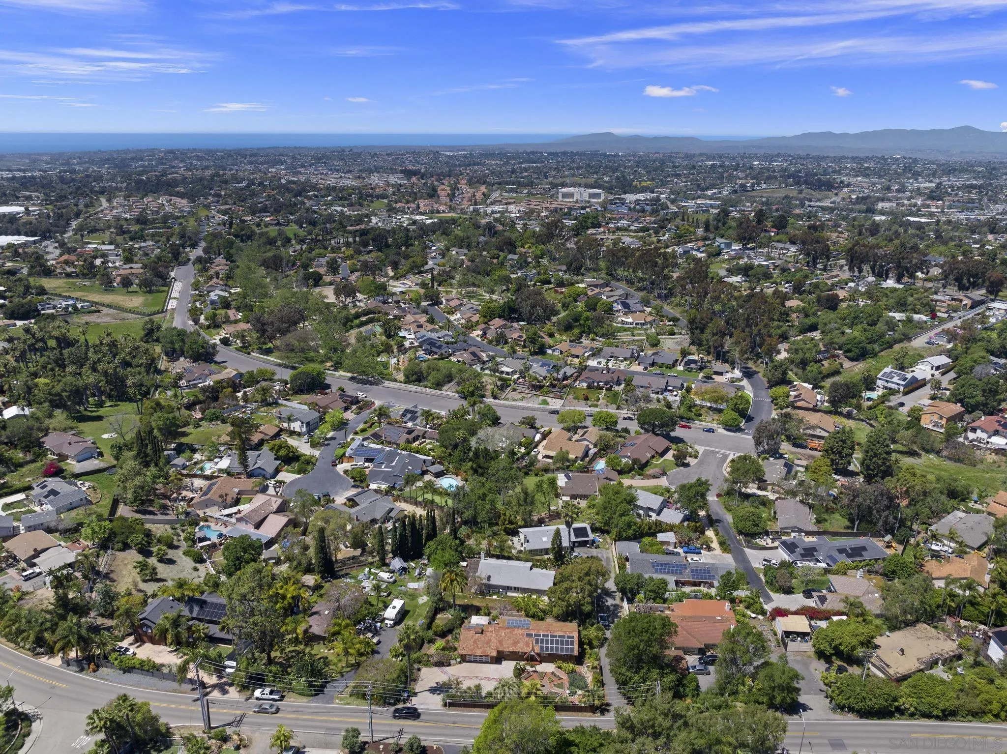 923 Sunset Drive Vista, CA 92081 - Photo 73 of 74 an aerial view of a city with lots of residential buildings