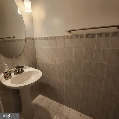 a view of a kitchen with a sink