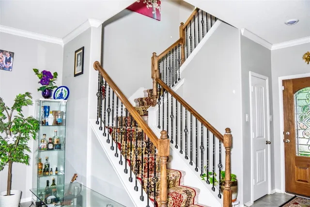 a bedroom with a bed and a table in it