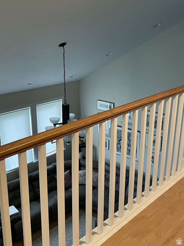 7030 West 2100 North Mendon, UT 84325 - Photo 33 of 67 Overlooking space featuring a white spindle railing with a wood-finish handrail
