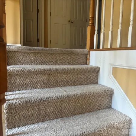 a close up of a couch with wooden floor