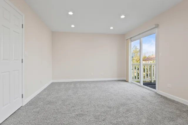 a bathroom with a granite countertop sink mirror and double