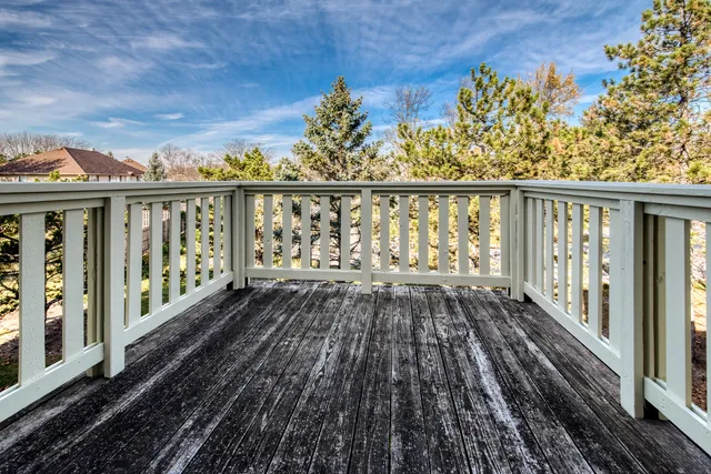a view of a house with a yard porch and sitting area