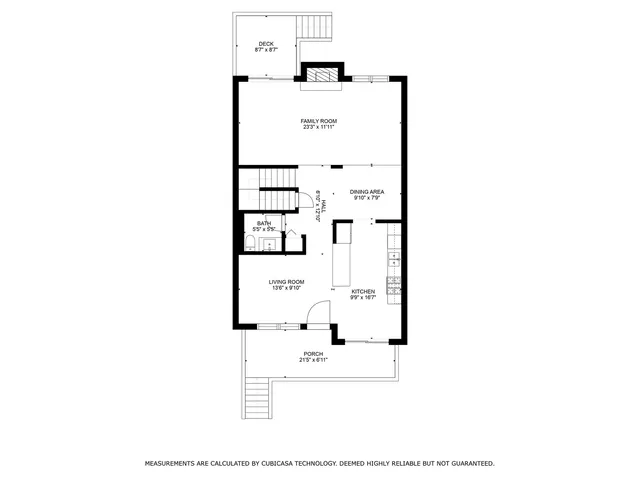 a picture of a bench in front of a wall