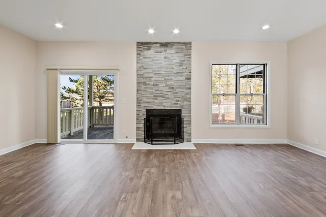 a view of a livingroom with wooden floor