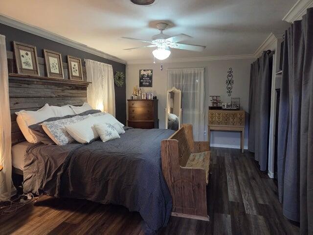 2596 Keith Valley Road Southeast Cleveland, TN 37323 - Photo 23 of 24 a bedroom with a bed and a chandelier