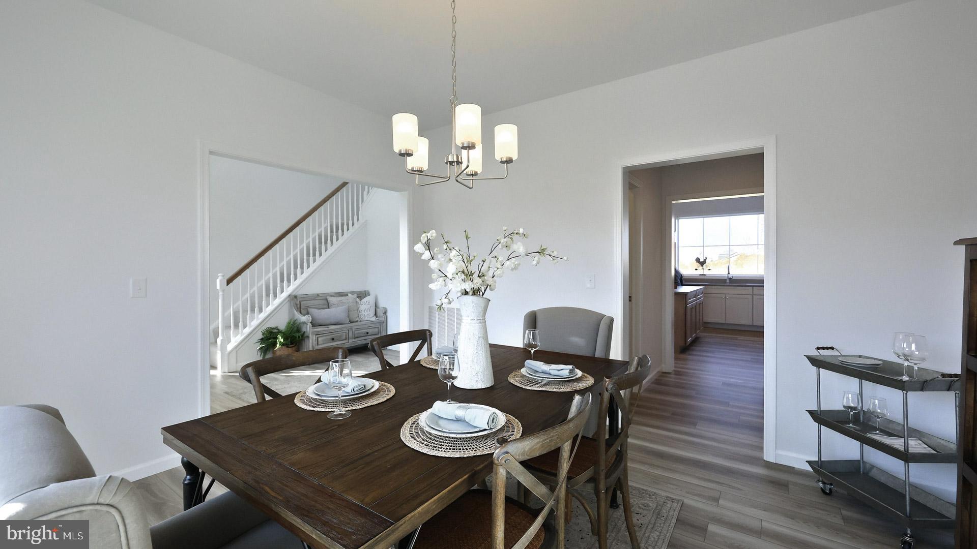 157 Copper Ridge Drive Newmanstown, PA 17073 - Photo 17 of 33 a view of a dining room with furniture and wooden floor