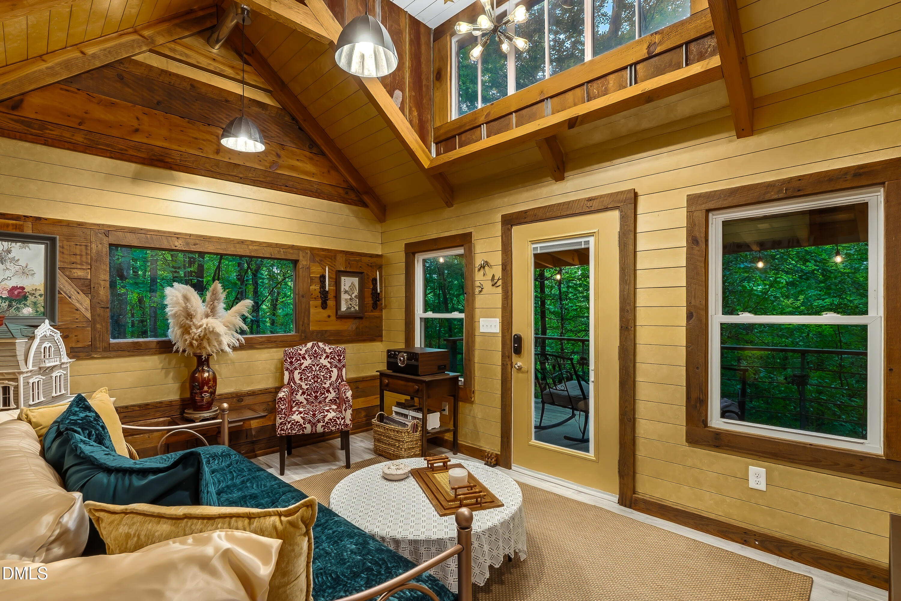 1214 Halcyon Place Rougemont, NC 27572 - Photo 53 of 69 a outdoor space with patio the couches and a dining table with the view of the balcony
