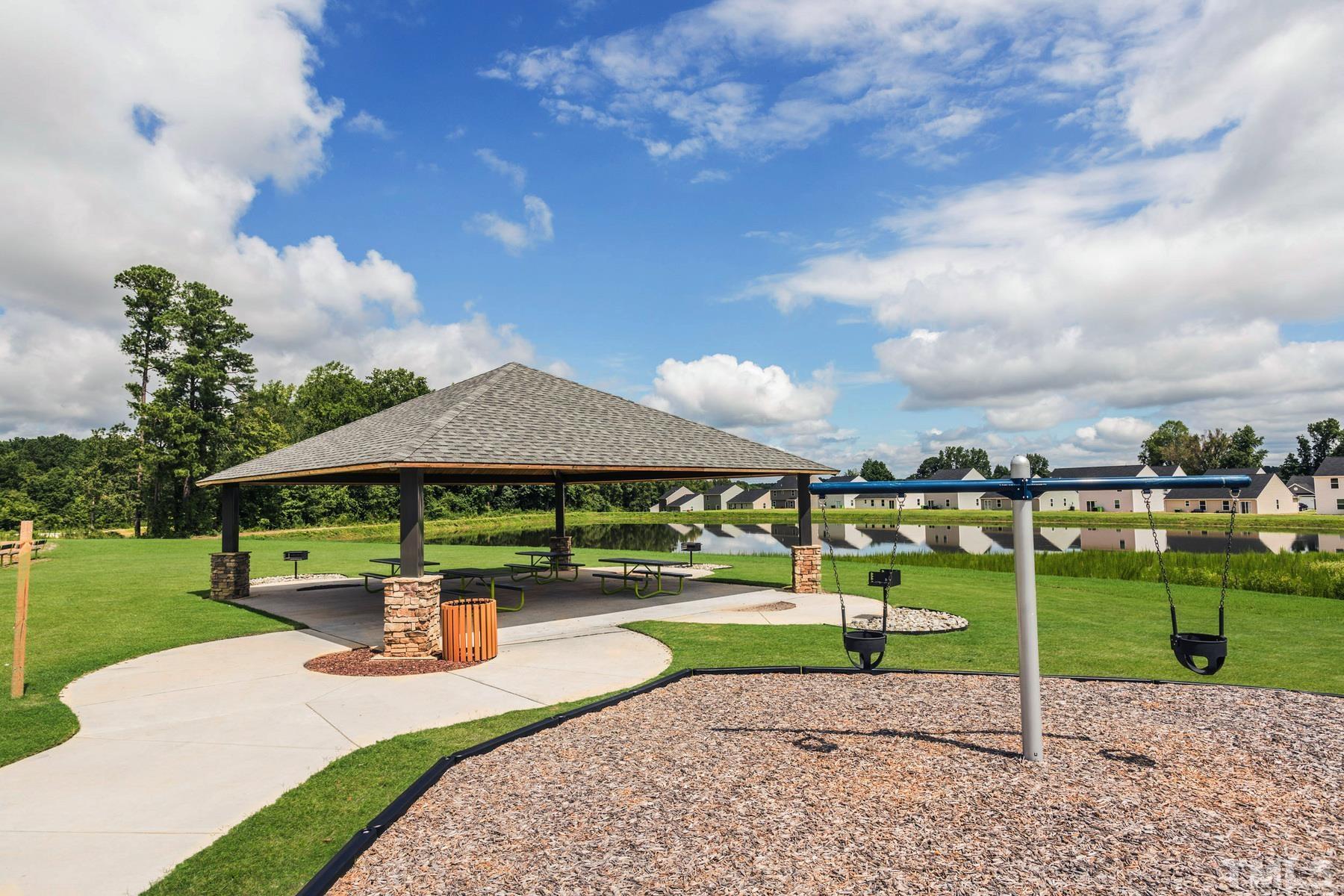 117 Brisk Drive Zebulon, NC 27597 - Photo 7 of 9 a park view with a garden space