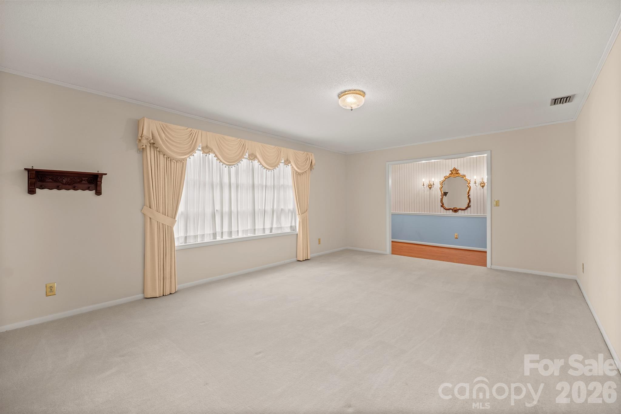 333 Sandy Ford Road Mount Holly, NC 28120 - Photo 12 of 42 an empty room with windows