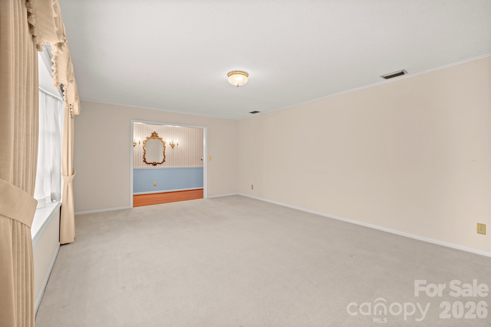 333 Sandy Ford Road Mount Holly, NC 28120 - Photo 13 of 42 an empty room with window