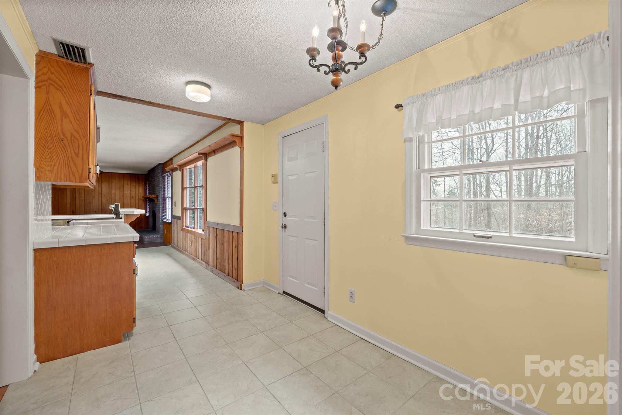 333 Sandy Ford Road Mount Holly, NC 28120 - Photo 25 of 42 a view of a kitchen with a sink and a refrigerator