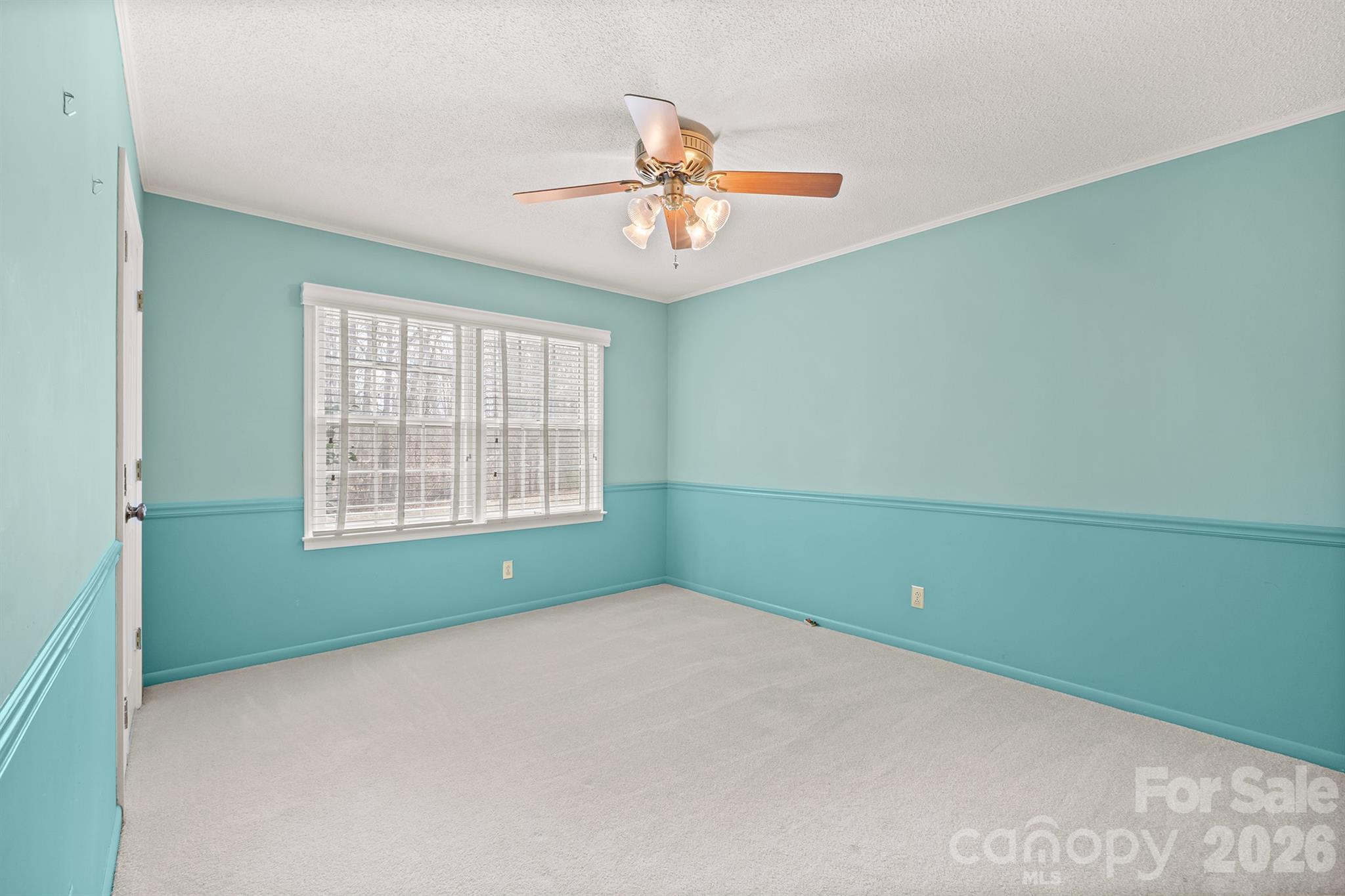 333 Sandy Ford Road Mount Holly, NC 28120 - Photo 31 of 42 a view of a room with windows and ceiling fan